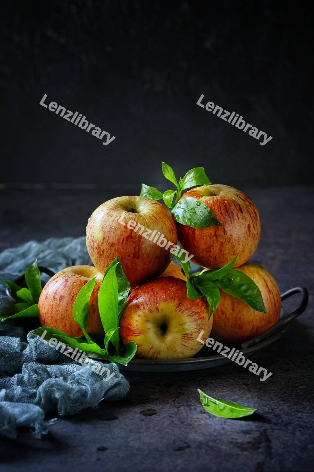 Red apples on a plate